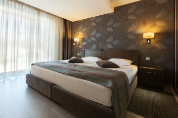 Ilustrasi kamar hotel.