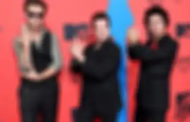 Green Day Ngajak Lo Joget Aerobik lewat Video Klip ‘Here Comes The Shock’