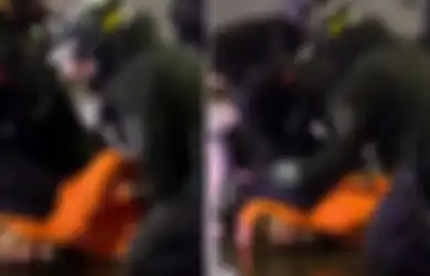 Nggak Mau Kasus George Floyd Terulang, Polisi Ini Bekuk Pelaku Penjarahan Pakai Lutut Tapi ke Punggungnya