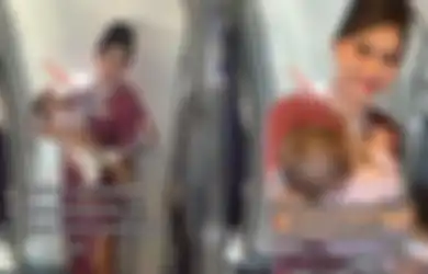 Jiwa Keibuannya Muncul Saat Lihat Penumpang Bayi Nangis dalam Pesawat, Pramugari Cantik Ini Langsung Gendong sang Anak Sambil Diajak Main Aksinya Viral dan Tuai Banyak Pujian Netizen