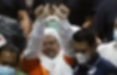 Difoto dengan Tangan Diborgol Plastik Hingga Pakai Baju Tahanan, Habib Rizieq Resmi Huni Penjara Rutan Polda Metro, Ini Alasan Polisi