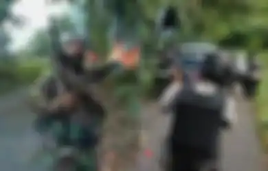 Gembong KKB Papua Berani Tampakkan Diri, Plato Merani Terekam Bawa Senjata Setelah Tembak Mati Warga, Polisi: Dia yang Berbicara di Video!