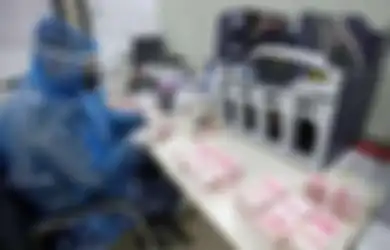 Takut Virus Corona, Wanita Tiongkok Panaskan Uang Rp 6,5 Juta di Microwave, Namun Kini Nasibnya Malah Apes