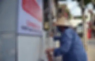 Bantu Warga Miskin saat Lockdown, Pemerintah Vietnam Buat 'Mesin ATM' yang Keluarkan Beras, Tinggal Pencet Tombol, Warga Dapat 2 Kg Beras dan Itu Gratis!