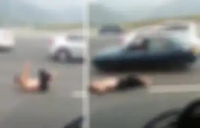 Diduga Mabuk, Pria Ini Nekat Lakukan Yoga di Tengah Jalan Tol