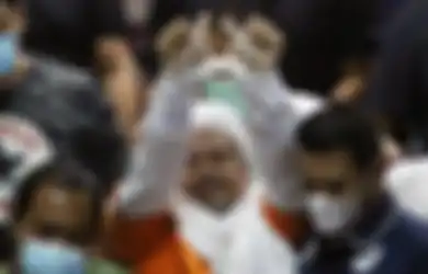 Difoto dengan Tangan Diborgol Plastik Hingga Pakai Baju Tahanan, Habib Rizieq Resmi Huni Penjara Rutan Polda Metro, Ini Alasan Polisi