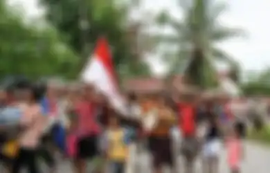 Terlepas dari Beringasnya KKB Papua, Inilah Uniknya Tradisi Papua Barat, Cuma Ada Di Sini Bawa Bendera Merah Putih dalam Tradisi Pernikahan