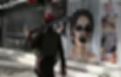 Poster & Foto Perempuan di Tembok Afghanistan Sengaja Dirusak Taliban
