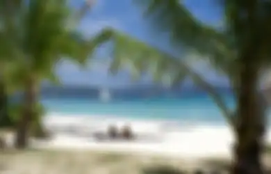 Agar Tak Gosong Hingga Cegah Kemungkinan Terseret Arus, Inilah 7 Tips Liburan ke Pantai