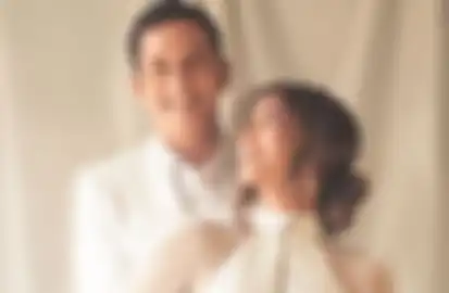 Janisaa Pradja dan Mike Lewis.