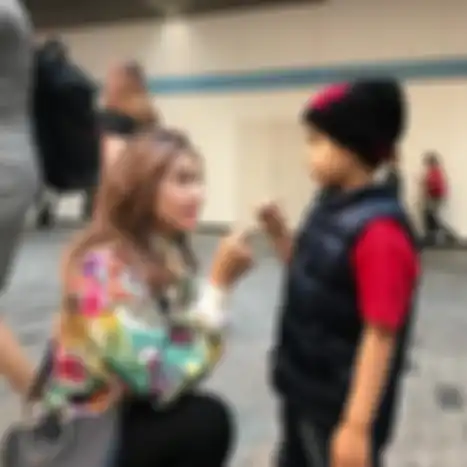 Cut Memey dan anak laki-lakinya dari Paul Rowland