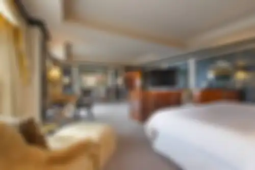 Kamar Syahrini yang menunjukkan sofa coklat tempatnya mengambil foto