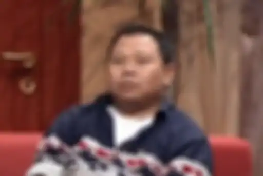 Almarhum Taufik Savalas