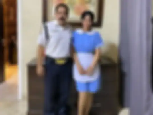 Adam Suseno dan Inul Daratista saat mengenakan kostum satpam dan asisten rumah tangga.