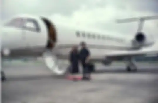 Atta Halilintar dan Aurel Hermansyah berpose di depan pesawat jet pribadi