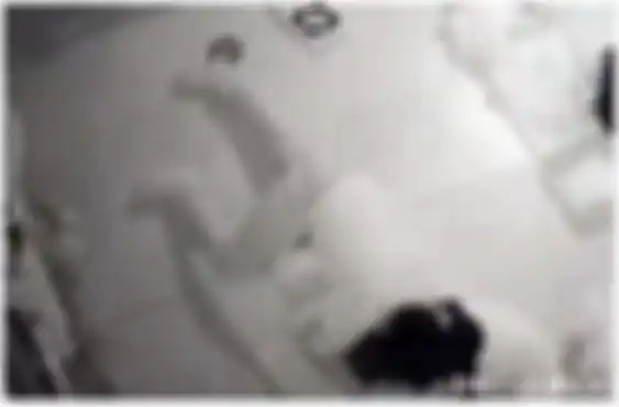 Pengasuh saat mendekap sang bayi terekam CCTV.