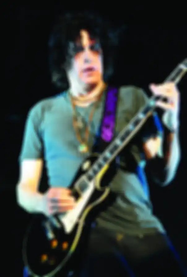 Gitaris Stone Temple Pilots, Dean DeLeo, dalam konser di Jakarta, Minggu (13/3/2011)