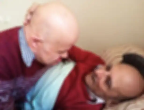 Joe,  61 (kiri) bersama ayahnya