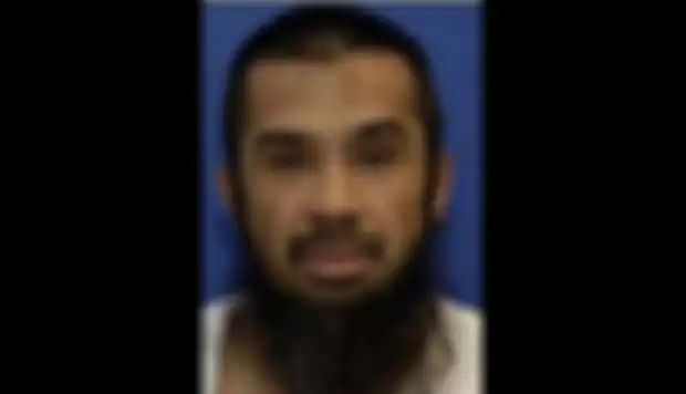 Riduan Isamuddin, lebih dikenal dengan nama Hambali, pemimpin kelompok Jemaah Islamiyah dan diyakini sebagai perwakilan tertinggi Al-Qaeda di Indonesia.