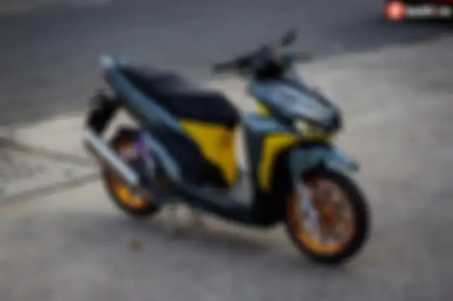 Seluruh bodi direpaint ulang dengan kombinasi warna mencolok.