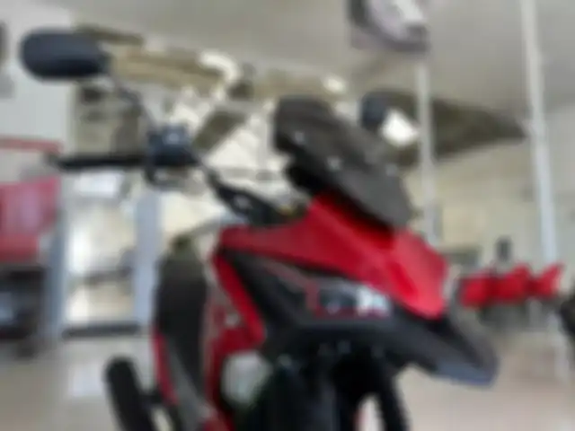 Bagian depan motor bebek trail ini seperti terinspirasi Ducati Multistrada.