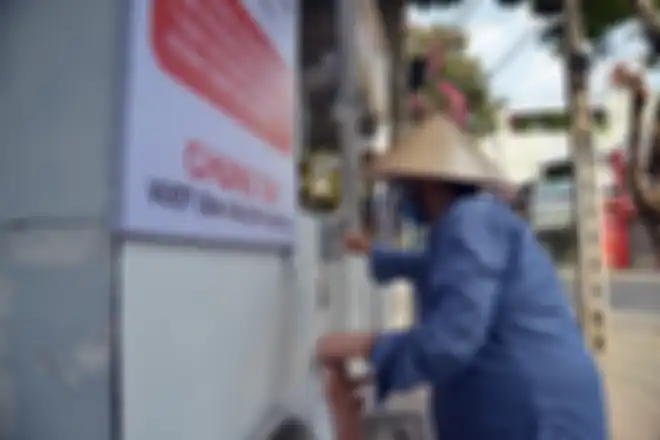 Mesin ATM yang mengeluarkan beras di Vietnam.