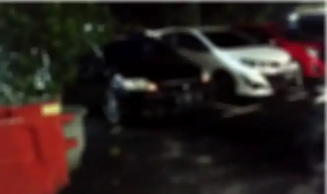 Honda City Ferdian Paleka di halaman parkir Satreskrim Polrestabes Bandung