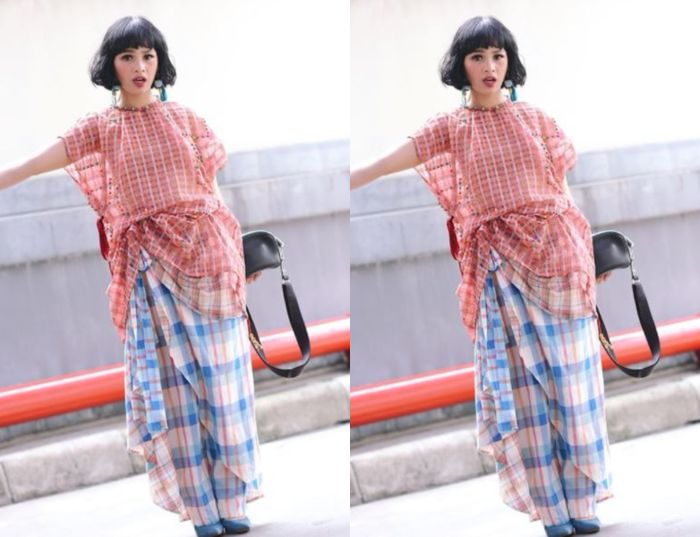 Andien terlihat mengenakan celana model kulot