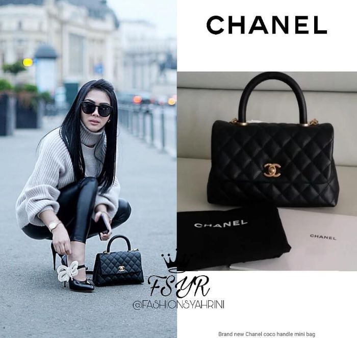 Syahrini tampak membawa tas koleksi dari brand ternama, Chanel