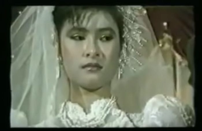 Penampilan Iis dalam Video Clip Tamu Tak Diundang