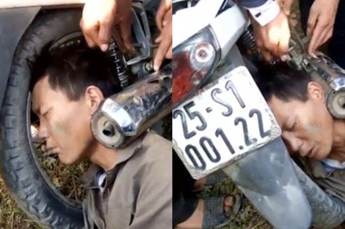 Kepala pria nyangkut di knalpot