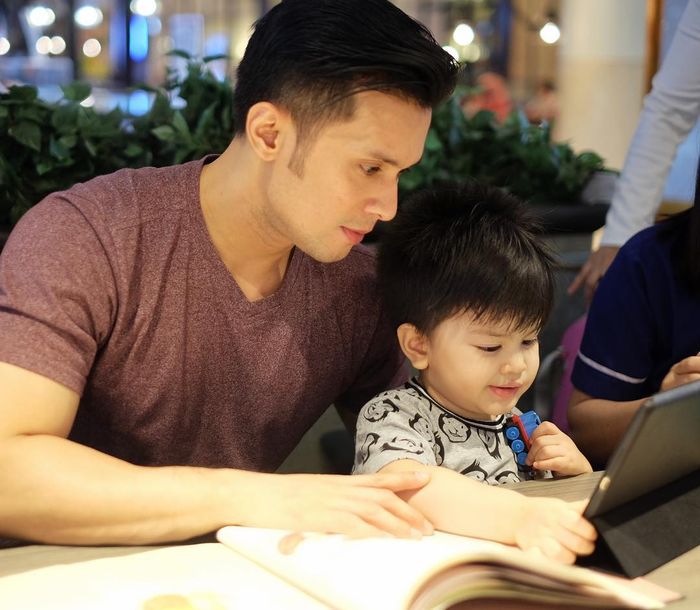 Afdhal Yusman dan putranya Reynand Messi Afdhal