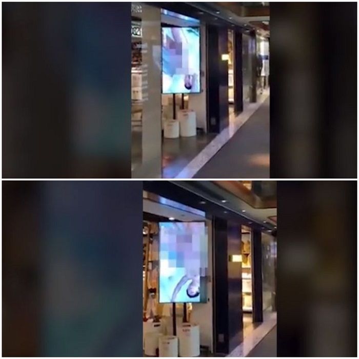 Video porno terputar di layar besar sebuah toko