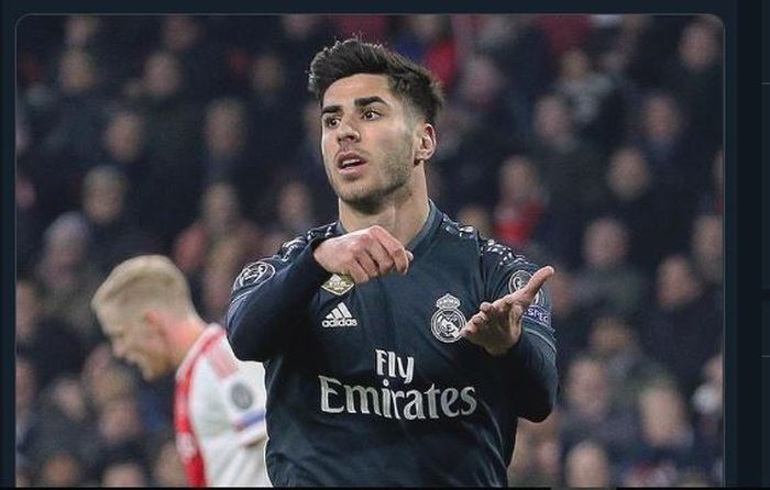 Penyerang Real Madrid, Marco Asensio seusai mencetak gol ke gawang Ajax Amsterdam.