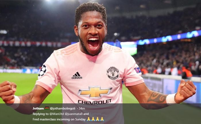 Fred merayakan kelolosan Manchester United ke perempat final Liga Champions usai mengalahkan Paris Saint-Germain.