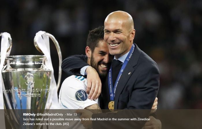 Isco dan Zinedine Zidane saling berpelukan merayakan kesuksesan Real Madrid memenangi Liga Champions ketiga kalinya berturut-turut 