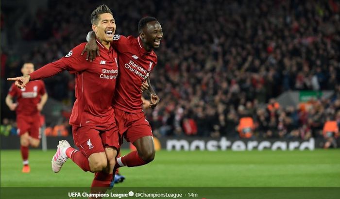 Gelandang Liverpool FC, Naby Keita, merayakan golnya bersama Roberto Firmino dalam laga leg I babak perempat final Liga Champions versus FC Porto di Stadion Anfield, Selasa (9/4/2019).