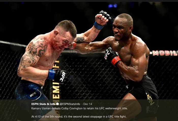 Colby Covington (kiri) dan Kamaru Usman (kanan) dalam pertarungan UFC 245, Minggu (15/12/2019).