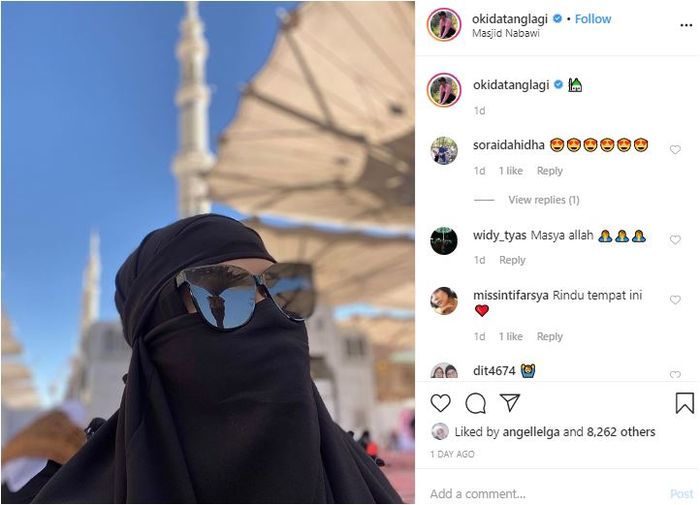 Okky Lukman memakai hijab dan cadar.