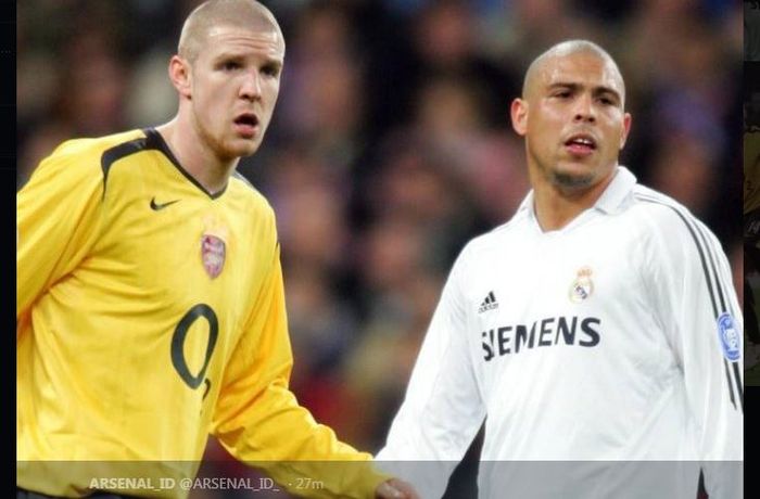 Philippe Senderos mengawal Ronaldo Luis Nazario dalam partai Real Madrid vs Arsenal.