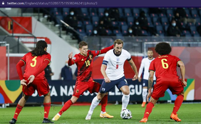 Pemain timnas Inggris, Harry Kane, berada di tengah pengawalan para pemain timnas Belgia dalam laga kelima Liga A Grup 2 UEFA Nations League 2020-2021, Minggu (15/11/2020) waktu setempat atau Senin pukul 02.45 WIB.