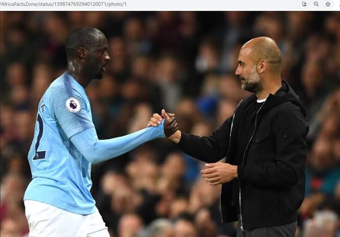 Yaya Toure dan Pep Guardiola saat masih sama-sama membela Manchester City.