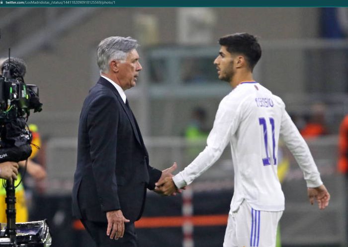 Pelatih Real Madrid, Carlo Ancelotti dan Marco Asensio.