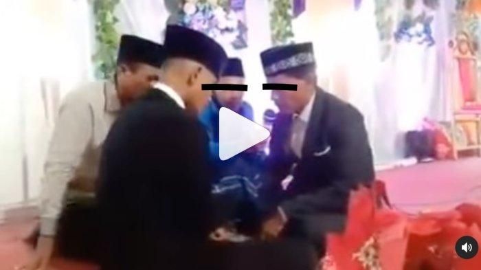 Sebuah video viral memperlihatkan seorang calon ayah mertua yang tiba-tiba menendang calon menantunya di meja akad. Calon ayah mertua mendadak emosi di depan keluarga dan tamu undangan.