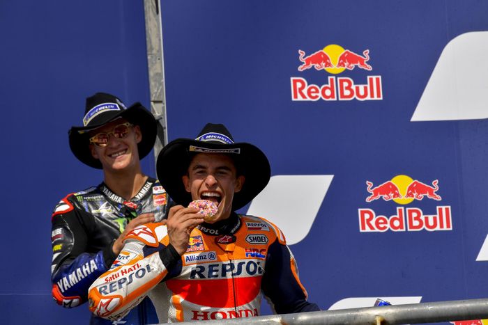 Pembalap Repsol Honda, Marc Marquez, merayakan kemenangan pada MotoGP Americas 2021 di Circuit of The Americas (COTA), Minggu (3/10/2021).