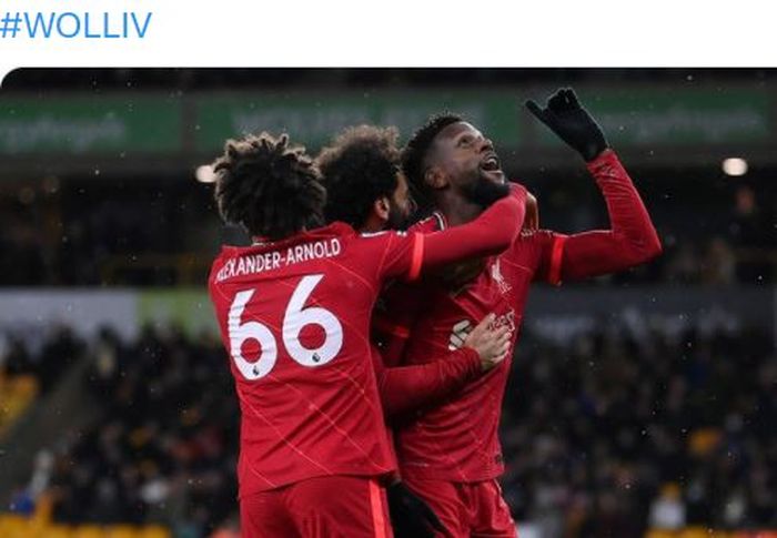 Striker Liverpool, Divock Origi, merayakan gol dalam laga Liga Inggris kontra Wolverhampton Wanderers di Stadion Molineux, Sabtu (4/12/2021).