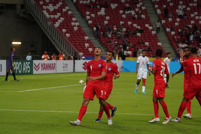 Striker Singapura, Ikhsan Fandi, merayakan gol yang dicetaknya ke gawang Myanmar pada fase grup Piala AFF 2020