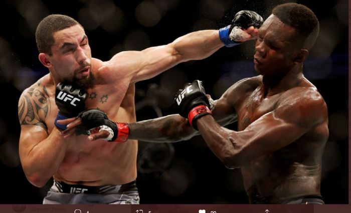 Pertandingan Israel Adesanya vs Robert Whittaker pad UFC 271, Minggu (13/2/2022).