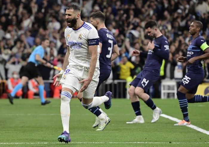 Striker Real Madrid, Karim Benzema, merayakan gol ke gawang Manchester City dalam laga leg kedua semifinal Liga Champions di Stadion Santiago Bernabeu, Rabu (4/5/2022).