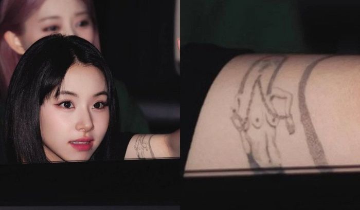 Potret tato baru Chaeyoung di lengan tangannya.